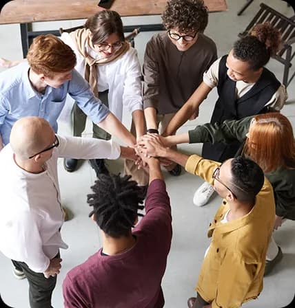 a team putting their hands together